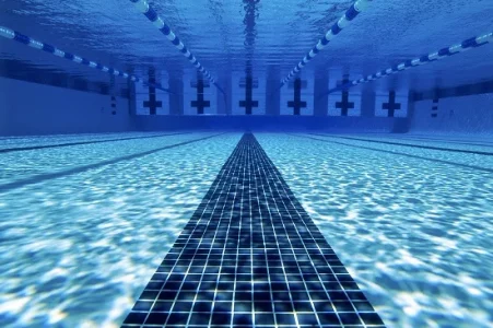 What is the volume of pool water measured by?